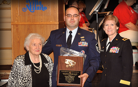 Marty Reissig, Armed Forces Community Relations Council member, and Maj. Gen. Deborah A. Ashenhurst, Ohio adjutant general, present Master Sgt. Daniel Petry, a communications supervisor with the Ohio Air National Guard's 121st Air Refueling Wing, with the Outstanding Serviceperson of the Year award.