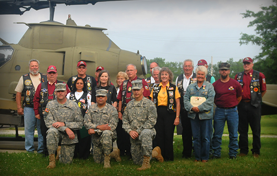Brig. Gen. John C. Harris Jr. (center), Ohio assistant adjutant general for Army, state Command Sgt. Maj. Rodger M. Jones (right) and Chief Warrant Officer 5 Jay K. Stuckman, the Ohio Army National Guard command chief warrant officer pose with members of the Ohio Patriot Guard Riders.