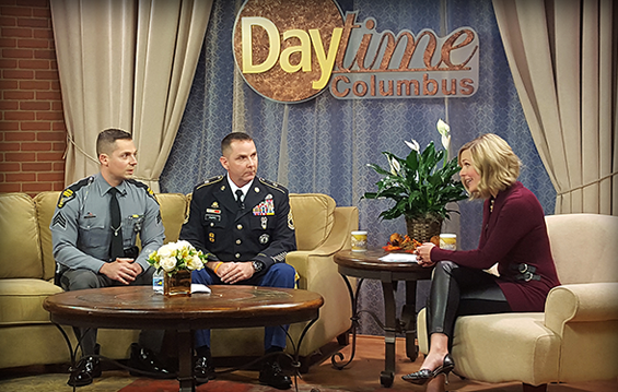 Ohio State Highway Patrol Sgt. Vincent Shirey (from left) and Ohio Army National Guard Sgt. 1st Class James Phipps speak with Daytime Columbus host Crystal George.