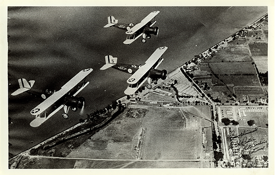 Planes from the 112th Observation Squadron, 37th Division Aviation fly over Camp Perry, Ohio, c. 1935. 