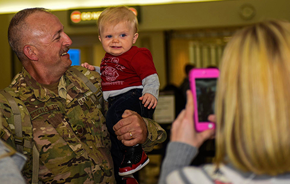 Master Sgt. Scott Brocklehurst, a member of the 220th Engineering Installation Squadron, is reunited with his Family after returning home from deployment.