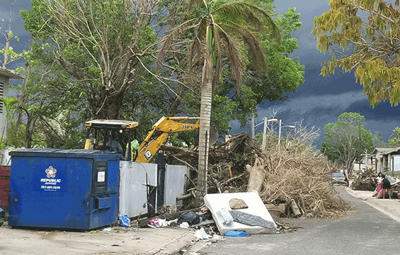 Catastrophic damage in street of Puerto Rico.