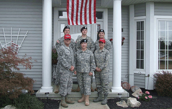 Members of the Clemens Family on front porch- 2014.