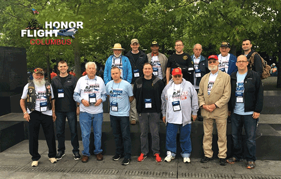 Candidates from Ohio Army National Guard Officer Candidate School Class 64 with eight veterans on an Honor Flight.