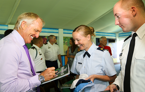 Former PGA player and 2017 Memorial Tournament Honoree Greg Norman (from left) signs programs for Maj. Brandy Piacentino, of the 179th Airlift Wing, and 1st Lt. Aaron Smith, of the 174th Air Defense Artillery Brigade, during a luncheon for service members as part of Military Appreciation Day at the Memorial Tournament <strong>May 31, 2017</strong>, at Muirfield Village Golf Club in Dublin, Ohio. Go to Flickr for more photos and YouTube for a video roll-up of the day's events.