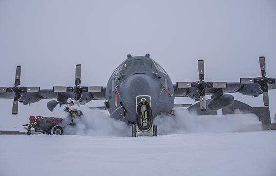 C-130H Hercules covered in snow.