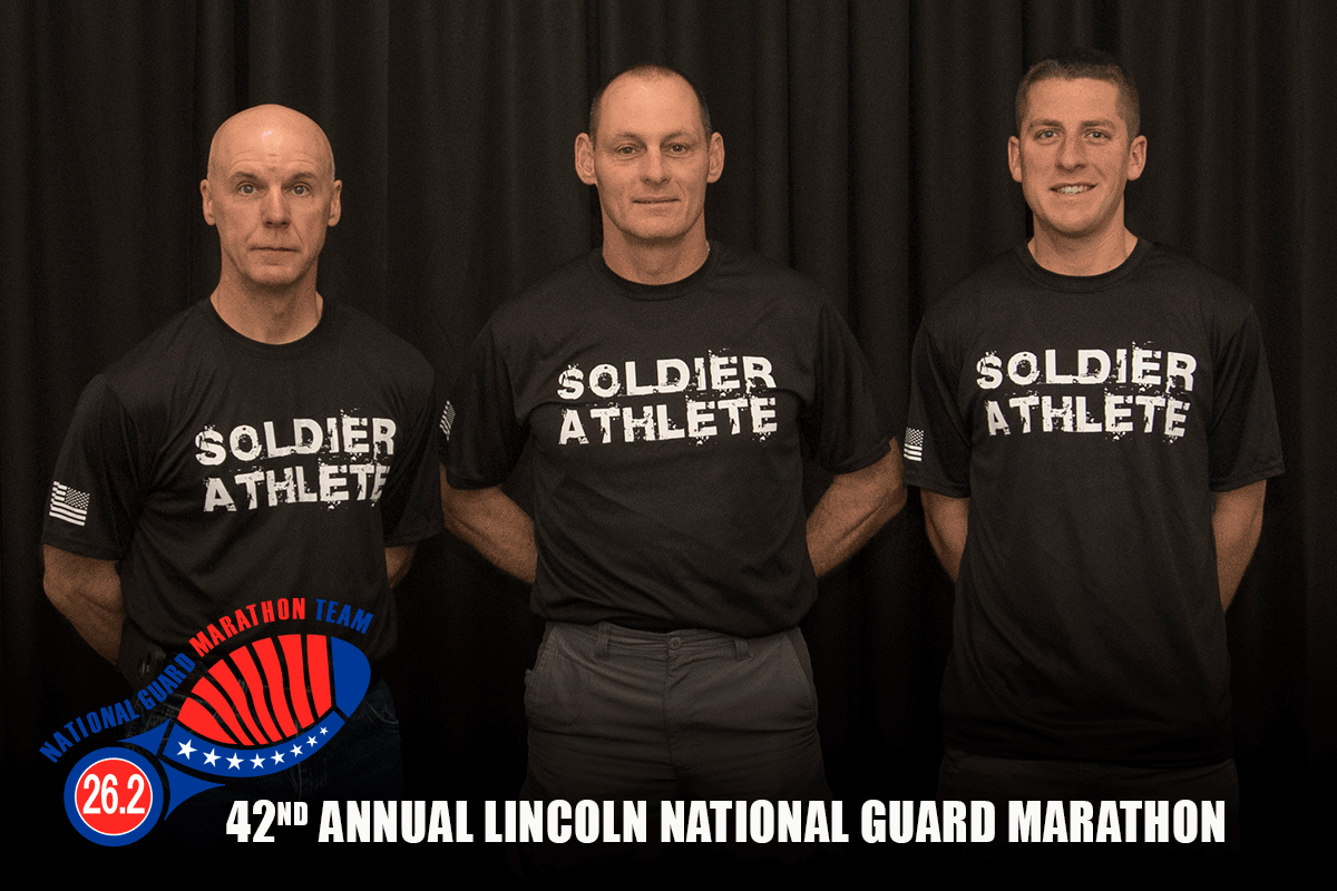 3 ONG marathon team pose in SOLDIER ATHLETE t shirts.