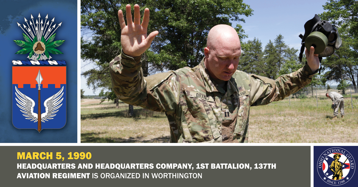 June 24, 2018, photo, Capt. Jason Brand, commander of Headquarters and Headquarters Company, 1st Battalion, 137th Aviation Regiment, tries to catch his breath after leaving the CS gas chamber during annual training at the Camp Grayling Joint Maneuver Training Center in Grayling, Mich.