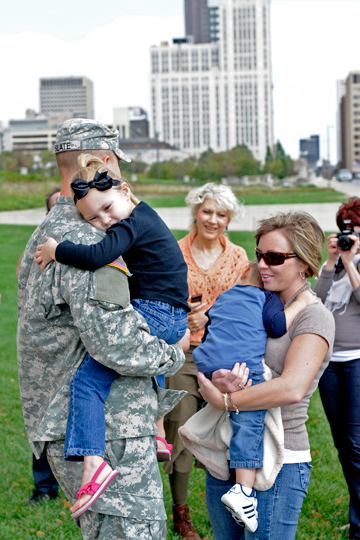 Chief Warrant Officer 2 Zachary Slate and his Family take a moment before the call to duty ceremony.