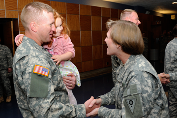 Maj. Gen. Deborah A. Ashenhurst, Ohio adjutant general, gives her best wishes to Staff Sgt. John Miller and his daughter.
