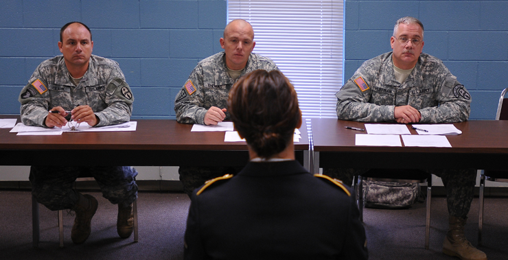 Pvt. Adrienne Benton, a light-wheeled vehicle mechanic for the 211th Maintenance Company out of Newark, Ohio, and a Bellville, Ohio native, is questioned by board members