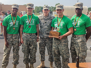 Members of the winning team at the 2014 Minuteman Ironman competition