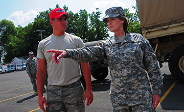 Maj. Gen. Deborah A. Ashenhurst, Ohio adjutant general, discusses situation with Guard Member.