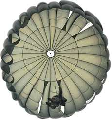 Sgt. First Class Corey Masters maneuvers his parachute as he prepares for a landing, June 8, 2014, at Rickenbacker Air National Guard Base in Columbus, Ohio.  More than 30 members of the Special Forces unit were conducting a jump into the drop zone at Rickenbacker as part of their weekend drill training.