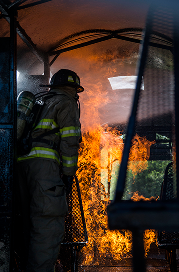 Ohio Army National Guard firefighters with the 295th and 296th Engineer Detachments and 513th Engineer Detachment await participate in a live burn exercise.