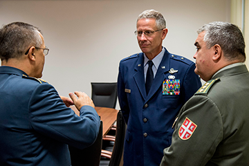 Brig. Gen. Gregory N. Schnulo (center), Ohio assistant adjutant general for Air, with members of the Serbian Armed Forces.