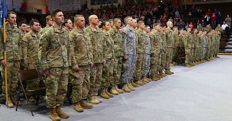 Soldiers of the 1st Battalion, 148th Infantry Regiment stand at attention during the unit’s call to duty ceremony