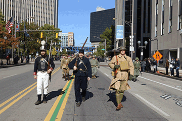 Re-enactors portraying different eras in U.S. military history