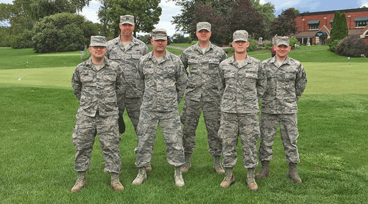 Six Airman from the 269th Combat Communications Squadron pose for photo.