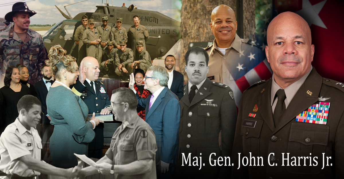 MG John C Harris salutes formation of Soldiers as he walks through from Black Hawk helicopter.