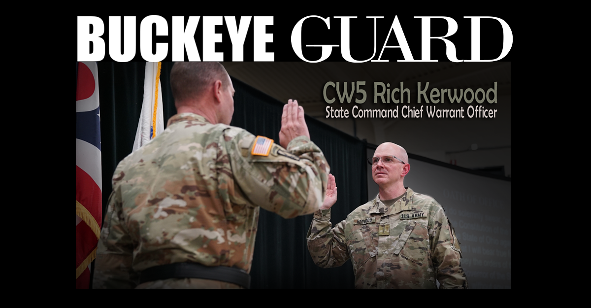 Chief Warrant Officer 5 Richard Kerwood raises hand to take his oath of office with Brig. Gen. Thomas E. Moore II.