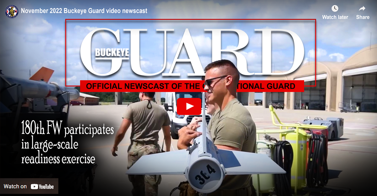 Cover of Buckeye Guard video- Airman carries armament.