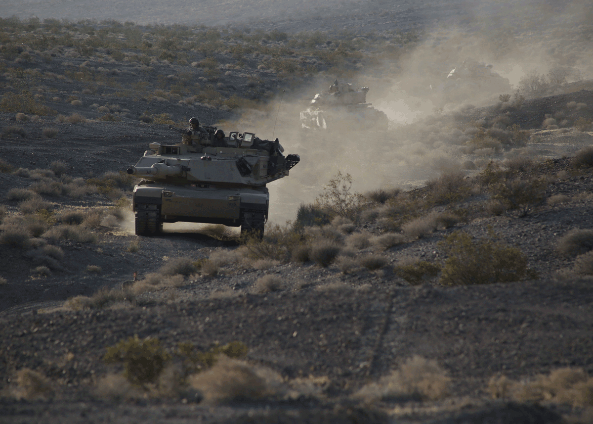 Tanks driving in open terrain.