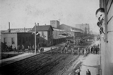 Soldiers in gravel streets of Cleveland in 1877.