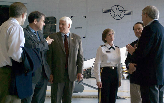 Maj. Gen. Deborah A. Ashenhurst (third from right), Ohio adjutant general, discusses the capabilities of the 179th Airlift Wing’s C-27J Spartan aircraft Monday, March 19, 2012, in Mansfield, Ohio, with U.S. Rep Jim Jordan (from left), U.S. Sen. Sherrod Brown, U.S. Rep. Bob Gibbs, U.S. Rep. Pat Tiberi and U.S. Sen. Rob Portman. 