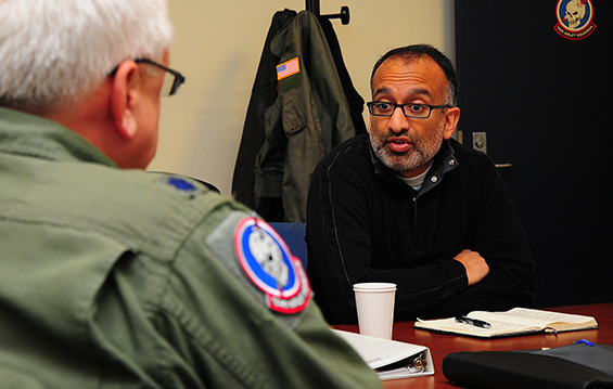 Rajiv Chandrasekaran (right), senior correspondent and associate editor at The Washington Post, interviews Lt. Col. Pete Tesner, flight commander with the 164th Airlift Squadron