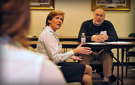 The Rev. Frank A. Edmands II (right), priest-in-charge at Trinity Episcopal Church, located in London, Ohio, listens while Maj. Gen. Deborah A. Ashenhurst, Ohio adjutant general, talks to clergy members who attended the inaugural Ohio National Guard Community Outreach Office clergy working group.