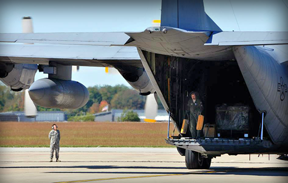 Airmen of the 179th Airlift Wing welcome the third C-130H Hercules cargo aircraft on Sept. 27, 2013, to the unit's base in Mansfield, Ohio. For its new mission, the 179th is receiving eight C-130Hs, with the final aircraft scheduled to arrive by June 2016.