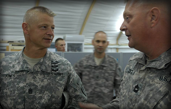 Command Sgt. Maj. Rodger M. Jones (left), Ohio Army National Guard state command sergeant major, talks with Master Sgt. Jeffery D. Zentz, one of 200 Soldiers from the 371st Sustainment Brigade currently deployed overseas in support of Operation Enduring Freedom.