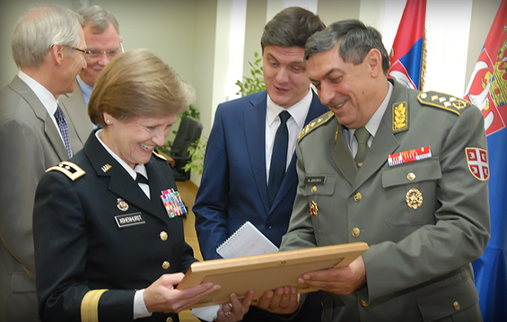 Maj. Gen. Deborah A. Ashenhurst (left), Ohio adjutant general, is presented with a gift from Gen. Ljubiša Diković, chief of the Serbian Armed Forces General Staff.