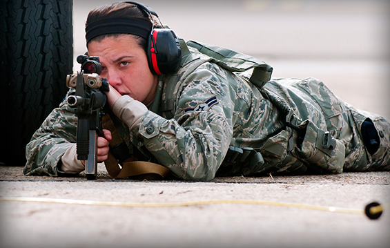 Airman 1st Class Casey Buccilla, a security forces specialist with the 121st Air Refueling Wing, secures her area of the flight line during a readiness inspection.