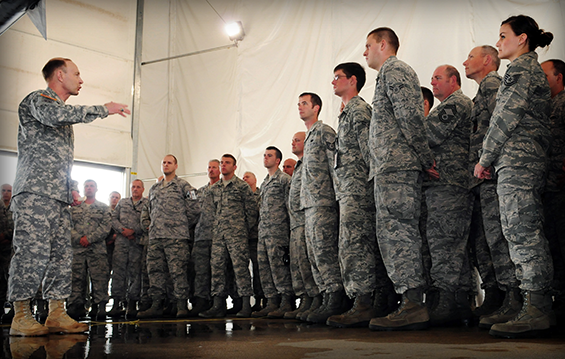 Army Gen. Charles H. Jacoby (left), commander of the North American Aerospace Defense Command and U.S. Northern Command, addresses Airmen at the 180th Fighter Wing, in Toledo, Ohio.