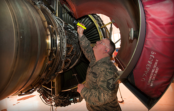 Master Sgt. Mark Rawlins, a crew chief with the 121st Air Refueling Wing, performs an inspection on a KC-135 Stratotanker.
