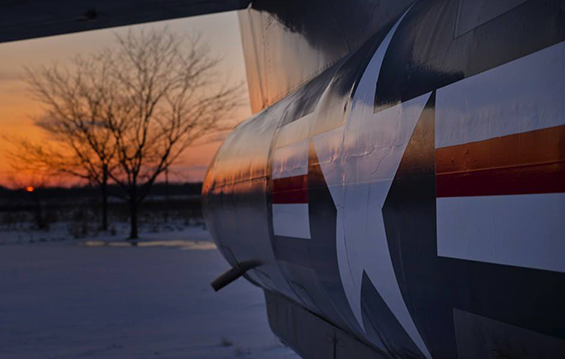 The light of the setting sun reflects off an F-84F Thunderstreak.