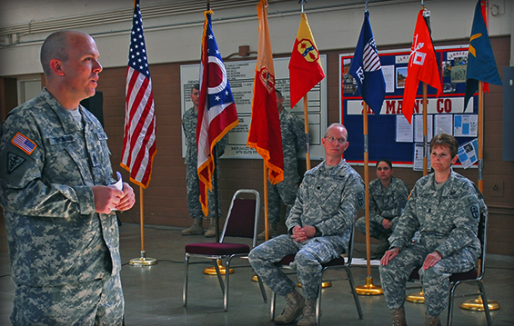 Newly promoted Command Sgt. Maj. Christopher Thomas (left), of the Special Troops Battalion, 371st Sustainment Brigade, addresses Soldiers and guests after a change of responsibility ceremony 