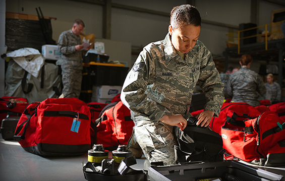 Staff Sgt. Aysha Harris, a biomedical equipment technician with the 121st Medical Group, packs her gear for a training event .