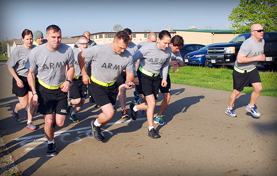 Soldiers of the 196th Mobile Public Affairs Detachment begin the 2-mile run event during an Army Physical Fitness Test.