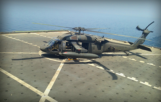 A UH-60 Black Hawk helicopter conducts Deck Landing Qualification.
