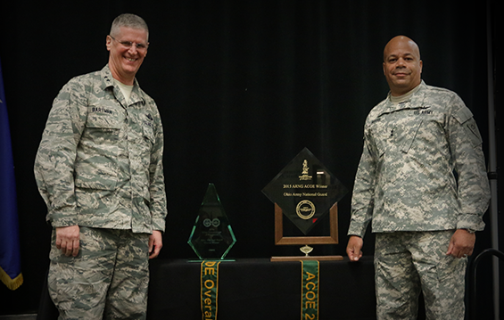 Maj. Gen. Mark E. Bartman (left), Ohio adjutant general, stands with Maj. Gen. John C. Harris Jr., Ohio assistant adjutant general for Army, Sept. 7, 2015, during a presentation ceremony for the Army Communities of Excellence award.