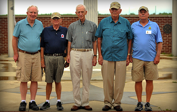 Retired Cols. Joe Bowsher (from left) and Dan Snyder, retired Brig. Gen. Herbert Eagon Jr., retired Col. Bob Dilts and retired Brig. Gen. Jack Lee stand by the flag pole at Camp Perry Joint Training Center.