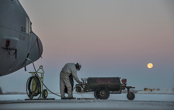 Tech. Sgt. Jordan Brown works to refill the 179th Airlift Wing’s C-130H Hercules fleet with liquid oxygen.
