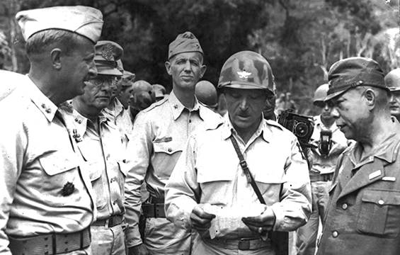 Japanese Gen. Tomoyuki Yamishita (right) commander of all Japanese forces in the Philippines, surrenders to U.S. forces.