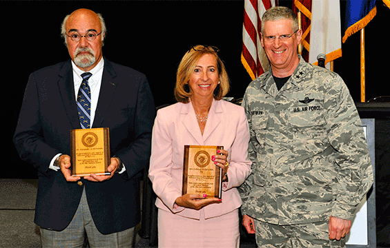 Maj. Gen. Mark E. Bartman, (right), Ohio adjutant general, presents guest speakers Dr. Alex Hernandez (left) and Debbie Ecker with plaques commemorating their support of the Holocaust Days of Remembrance presentation.