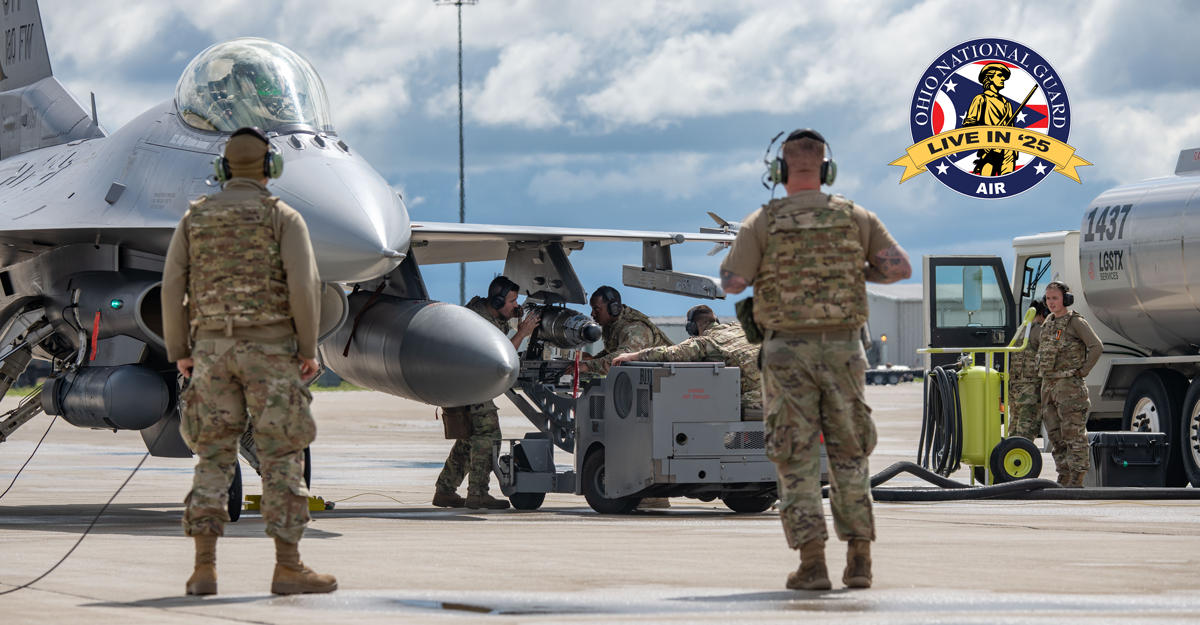 Airmen work on tarmak working on an f-16