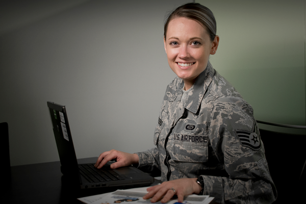 Staff Sgt. Jennifer D. Masters at desk.
