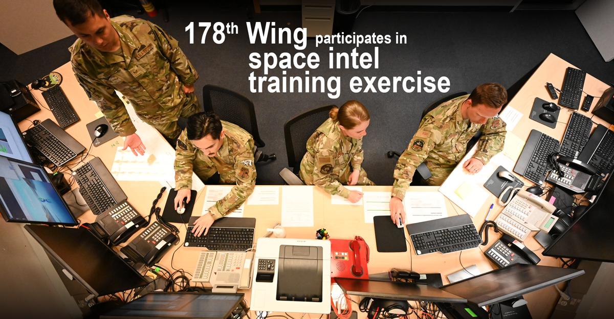 Airmen working on computers